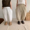 S8dc37621873745fa80be4c7cbb545426P.webp Pantalon Bébé en Coton Doux - Imprimés Tendres – détail de la matière (vue 3)